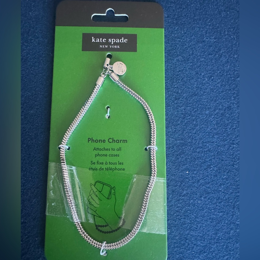 Kate Spade Silver Phone charm with chain! Attaches to all phone! Add some FUN♠️